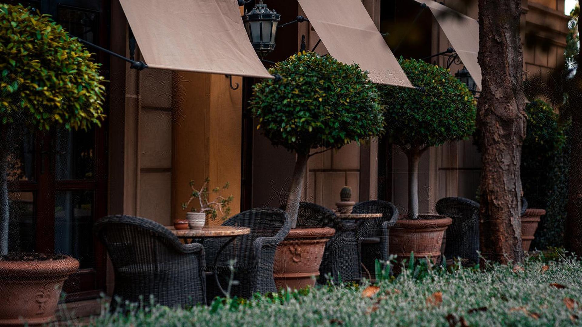 Palazzo Hotel フォーウェイズ エクステリア 写真 The hotel's garden